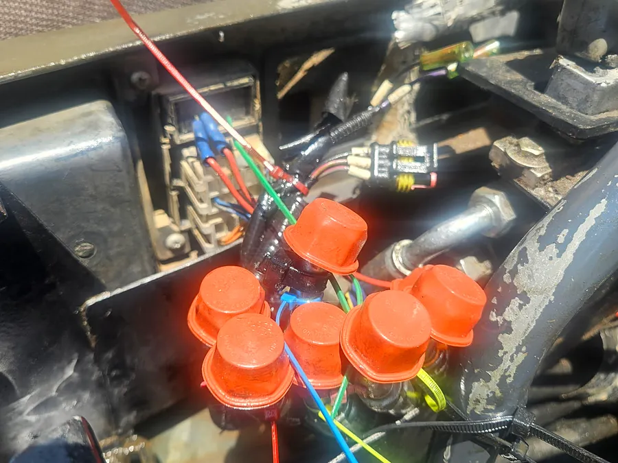 Wiring connectors capped and labeled during an electrical repair