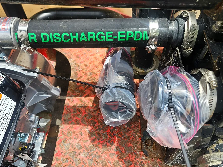 Replacement hydraulic hose and fittings installed on equipment