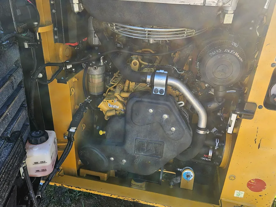Engine bay of a CAT machine opened for diagnostics